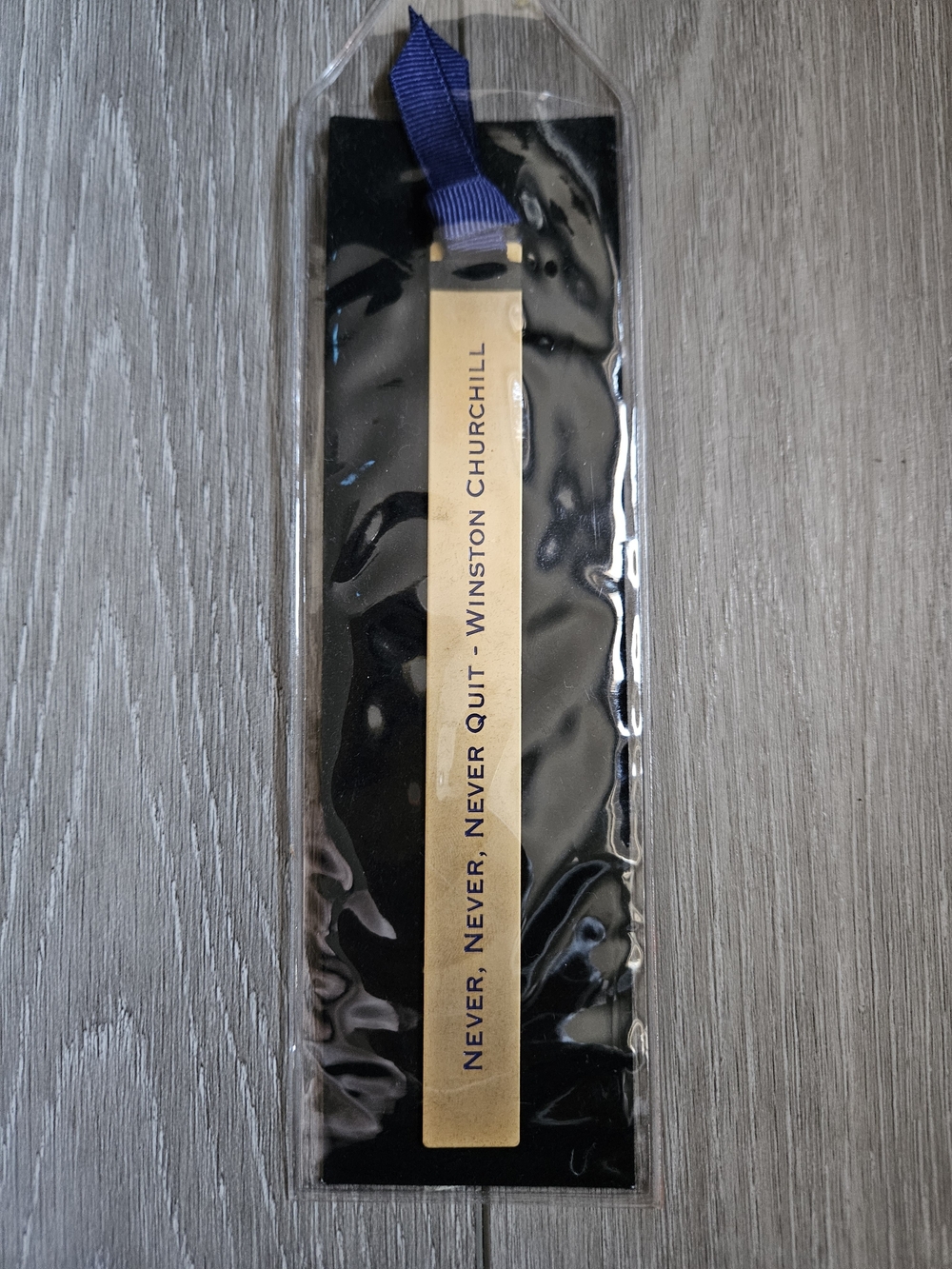 Gold Bookmark with Blue Ribbon – Inspirational Quote
